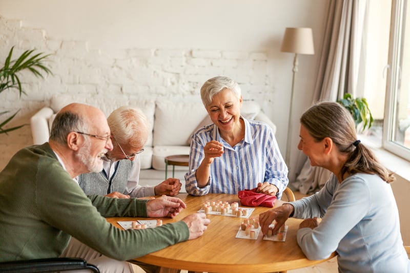 Group of seniors playing a boardgame